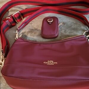 Red (non-leather) Coach bag